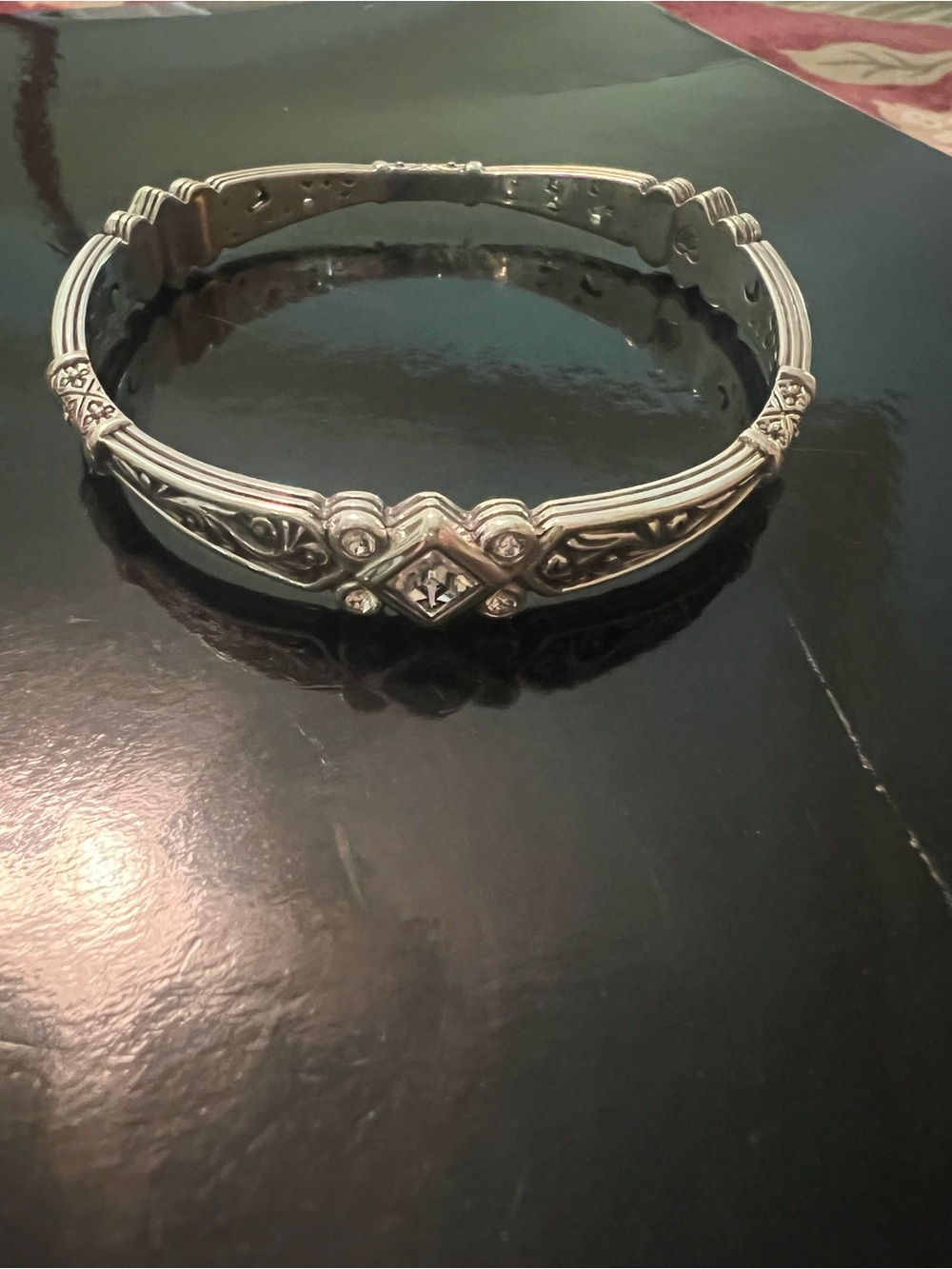Beautiful ornate silver tone bracelet.